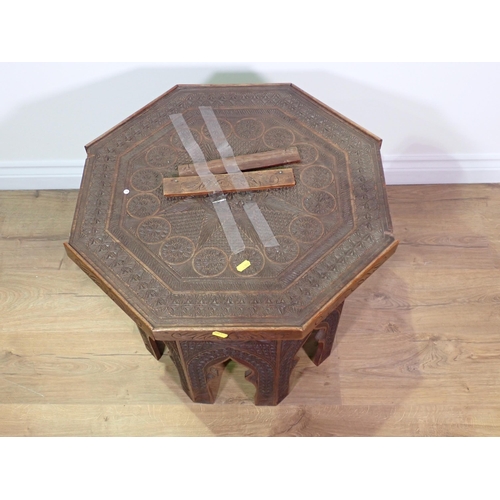 65 - A North African carved hardwood octagonal Occasional Table A/F 1ft 11in W x 1ft 8in H