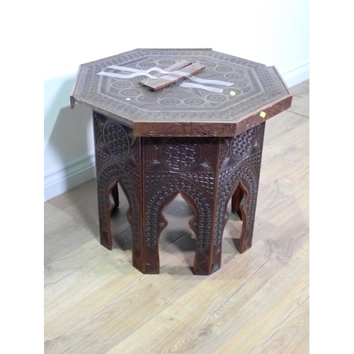 65 - A North African carved hardwood octagonal Occasional Table A/F 1ft 11in W x 1ft 8in H