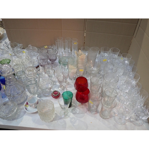 654 - A large quantity of glassware, including coloured glass wines, Decanter, Dishes, Tumblers, etc.