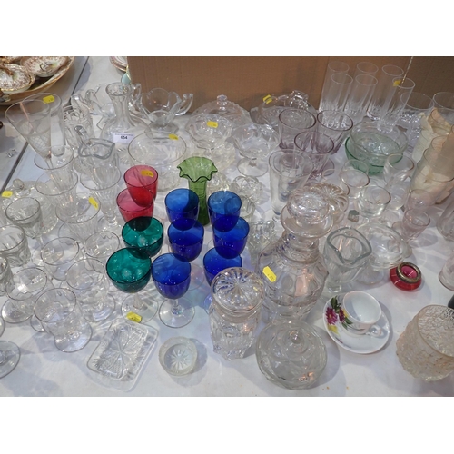 654 - A large quantity of glassware, including coloured glass wines, Decanter, Dishes, Tumblers, etc.