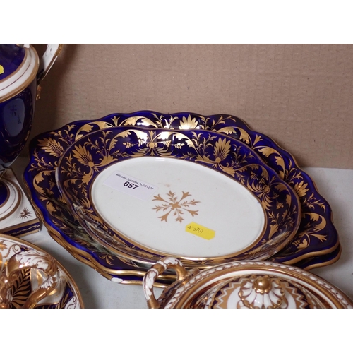 657 - A quantity of Crown Derby and other similar Teaware, with gilded decoration on a dark blue ground, s... 