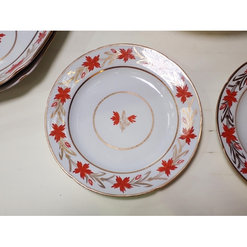 664 - A part dessert Service, decorated floral sprays in red and gilt, some A/F