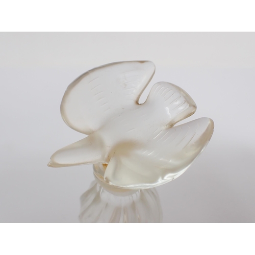 678 - A Lalique Scent Bottle with double leaf stopper, another Lalique Scent Bottle with a bird stopper an... 