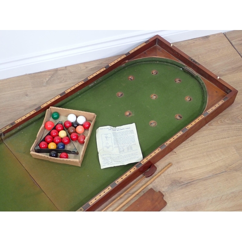 683 - A 19th Century mahogany Bar Billiards Table, two Cues and a set of Balls