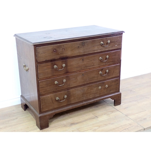 684 - A George III mahogany Chest with secretaire drawer above three drawers mounted on ogee bracket feet ... 