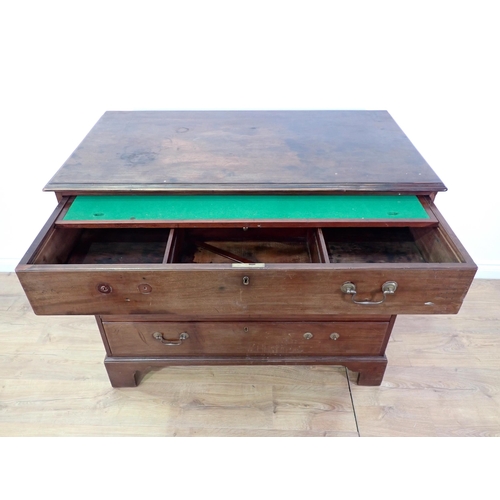 684 - A George III mahogany Chest with secretaire drawer above three drawers mounted on ogee bracket feet ... 