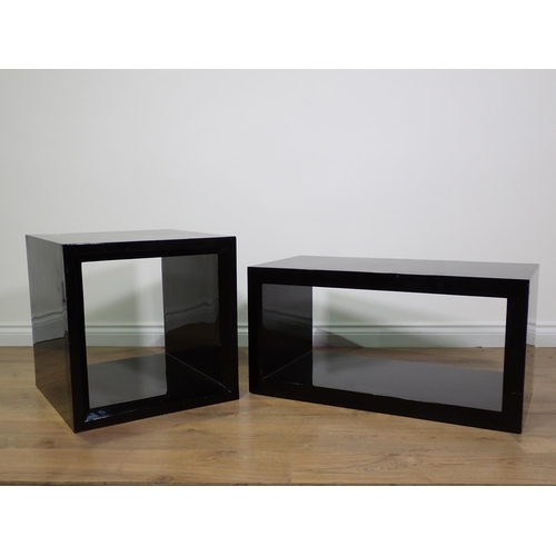 688 - Two modern black lacquered Coffee Tables