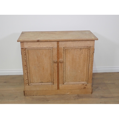 695 - A Victorian pine Cupboard fitted pair of panel doors on plinth base 3ft 4in W x 2ft 9in H