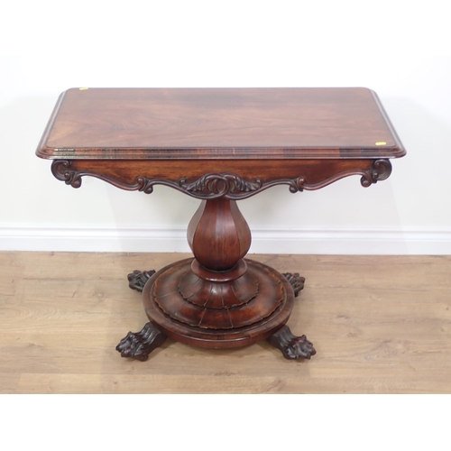 696 - A William IV rosewood Centre Table with moulded rectangular top upon octagonal baluster column, circ... 