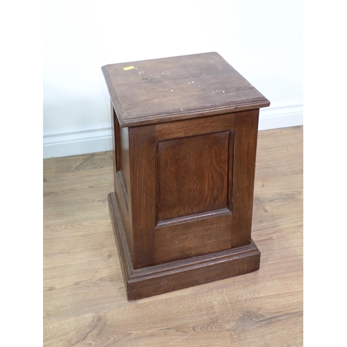 698 - An Eastern brass topped folding Table and a mahogany Plant Stand