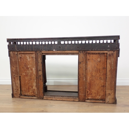 703 - A carved oak Overmantel