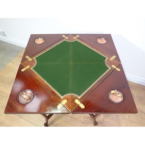 71 - An Edwardian mahogany and inlaid Envelope Card Table with urn decoration fitted single drawer mounte... 