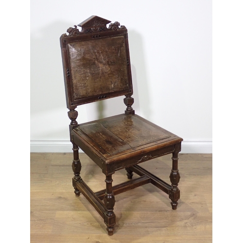 713 - A Victorian oak Hall Chair and an ash lathe back Rocking Chair