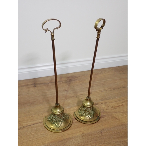 72 - A pair of brass Door Stops