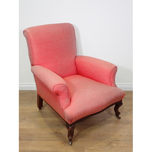 726 - A Victorian pink upholstered Armchair on mahogany cabriole supports