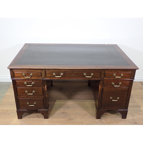 734 - A Georgian style mahogany twin pedestal Desk fitted eight drawers mounted on bracket feet 5ft W x 2f... 