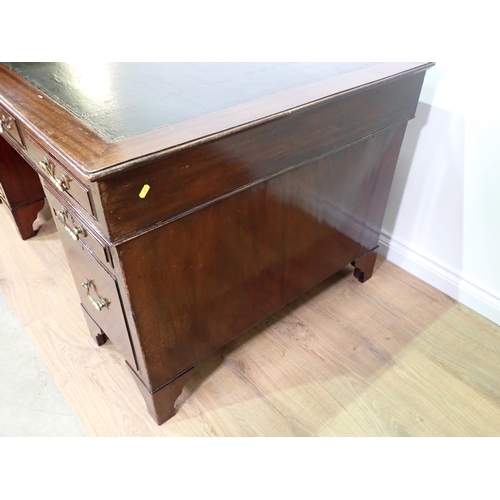 734 - A Georgian style mahogany twin pedestal Desk fitted eight drawers mounted on bracket feet 5ft W x 2f... 