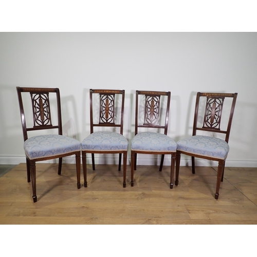 748 - A set of four late Victorian mahogany and inlaid with pierced backs and blue stuff over seats mounte... 