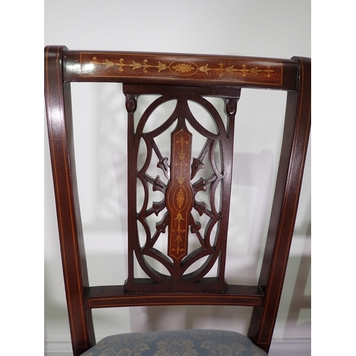 748 - A set of four late Victorian mahogany and inlaid with pierced backs and blue stuff over seats mounte... 