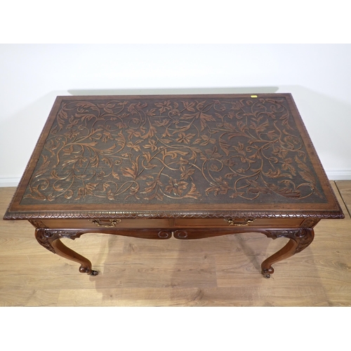 750 - A mahogany Side Table with trailing foliate carved top fitted two frieze drawers mounted upon cabrio... 