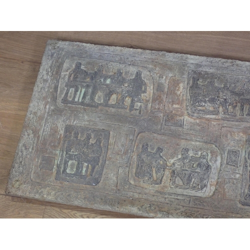 766 - A relief moulded composite stone Plaque depicting seated figures 3ft 6in W x 1ft 9in H