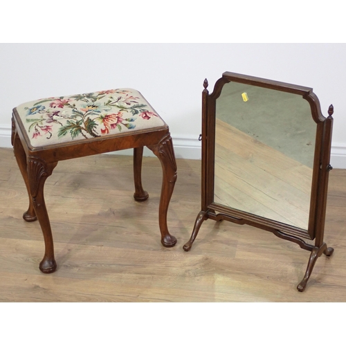 771 - A walnut Footstool with tapestry seat on shell carved supports and pad feet and a Dressing Mirror