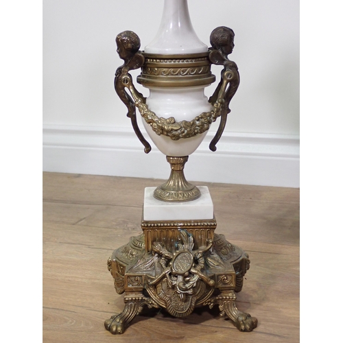 773 - A pair of marble effect and gilt brass seven branch Table Candelabra on ornate bases with paw feet 2... 