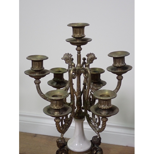 773 - A pair of marble effect and gilt brass seven branch Table Candelabra on ornate bases with paw feet 2... 