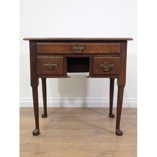 774 - An 18th Century oak Lowboy with moulded top fitted three drawers mounted on pad feet 2ft 7in W x 2ft... 