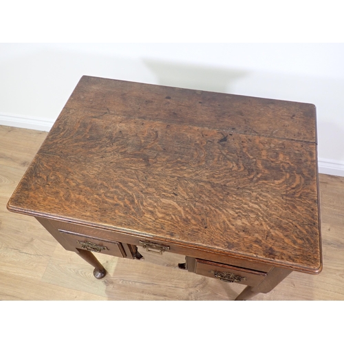 774 - An 18th Century oak Lowboy with moulded top fitted three drawers mounted on pad feet 2ft 7in W x 2ft... 