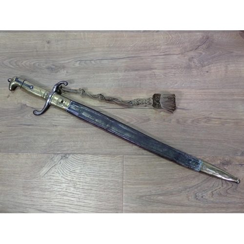 775 - A Bayonet in leather scabbard, two Shooting Sticks and two brass Fire Companion Sets