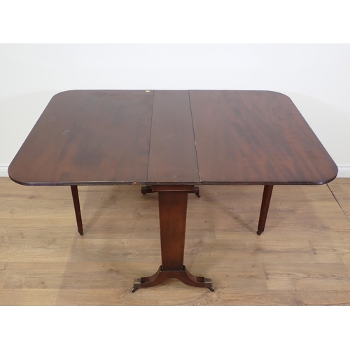 806 - A 19th Century mahogany Sutherland Table with brass toe caps and casters 3ft 3in W x 2ft 5in H