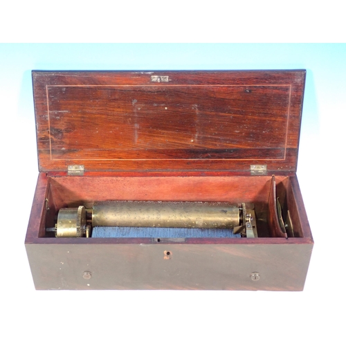 810 - A 19th Century rosewood and inlaid Music Box playing four airs (airs label present but not attached)... 