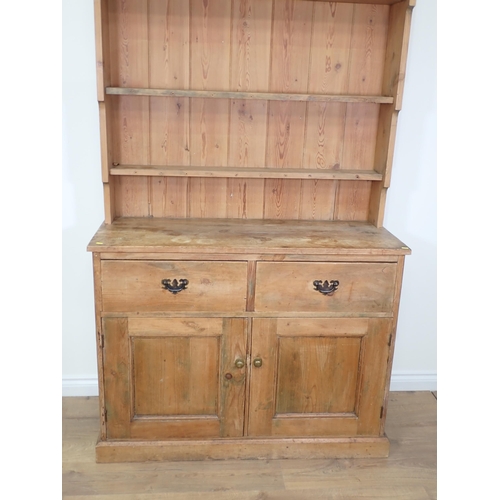 813 - An antique pine Dresser and rack the base fitted two drawers and two cupboard doors 7ft 2in H x 3ft ... 