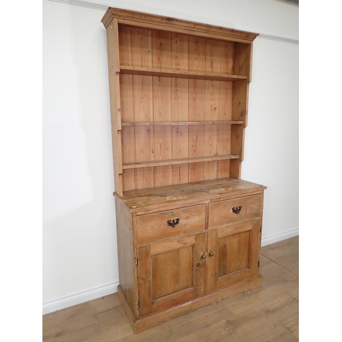 813 - An antique pine Dresser and rack the base fitted two drawers and two cupboard doors 7ft 2in H x 3ft ... 