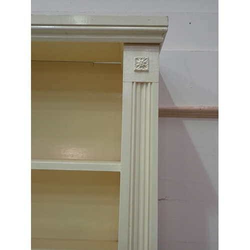 848 - A cream painted Bookcase/Cabinet with central mirror back having pierced frieze flanked by open shel... 