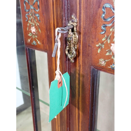 12 - An Edwardian mahogany and inlaid Display Cabinet with ribbon and rose painted decoration, fitted pai... 