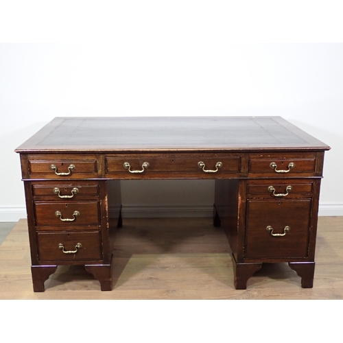 72 - A Georgian style mahogany twin pedestal Desk fitted eight drawers mounted on bracket feet 5ft W x 2f... 