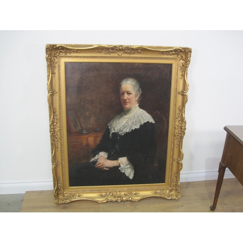 443 - CHARLES EDMOND BROCK. Portrait of Mary Jeudwine Levett, seated half-length, wearing black dress and ... 