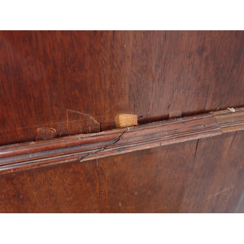 10 - A 19th Century mahogany Linen Press fitted pair of cupboard doors above base of two short and two lo... 