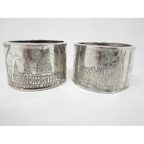 123 - A pair of Victorian silver Napkin Rings decorated Westminster Abbey and St Paul's, Butter Knife, She... 