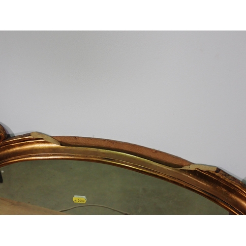 20 - A modern gilt framed Overmantle Mirror with rose and scrolled leafage design A/F 3ft 10in W x 3ft 2i... 