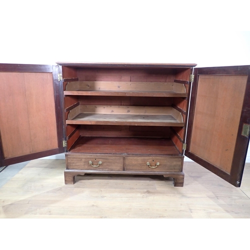 24 - A George III mahogany Press Cupboard fitted pair of doors enclosing slides above two drawers all mou... 