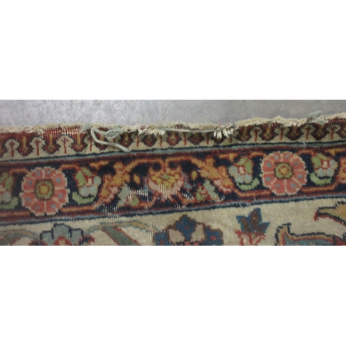 299 - A Persian Carpet of multi-bordered design with floral and scrolled design, on a red ground, 11ft 5in... 