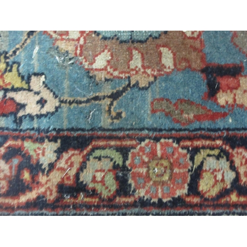 299 - A Persian Carpet of multi-bordered design with floral and scrolled design, on a red ground, 11ft 5in... 