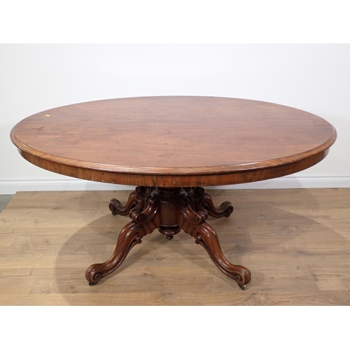 304 - A Victorian mahogany oval Loo Table on quadruple supports 4ft 11in W x 2ft 5in H