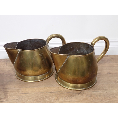 311 - An antique copper Cooking Pan, two Jugs and a Bowl