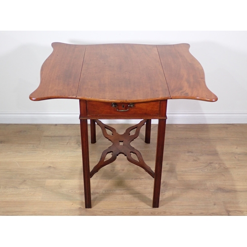 323 - A George III mahogany Pembroke Table with shaped top fitted end drawer mounted upon square supports ... 