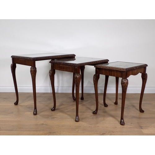 329 - A nest of three mahogany veneered Occasional Tables