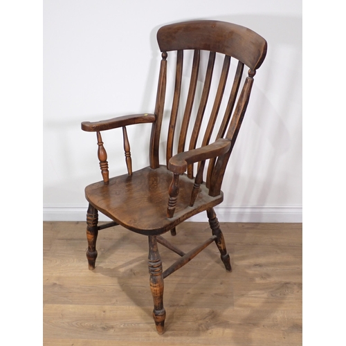 330 - A 19th Century ash and elm lathe back Kitchen Armchair on turned supports and H-stretcher 3ft 7in H ... 